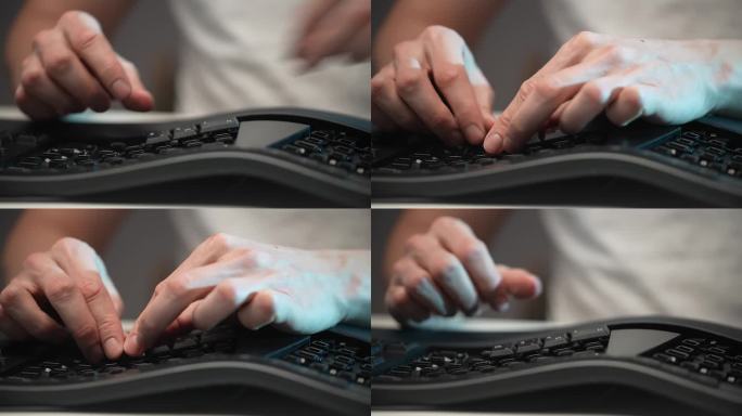 近距离的电脑主人的手组装拆卸键盘后，清理污垢。PC男性用户清洗后插入键盘按键。