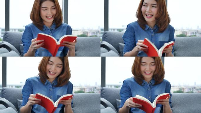 放松的亚洲女人坐在客厅的沙发上拿着书看书。年轻女子放松读书，打开书读书，休闲心灵。幸福美女人笑脸快乐