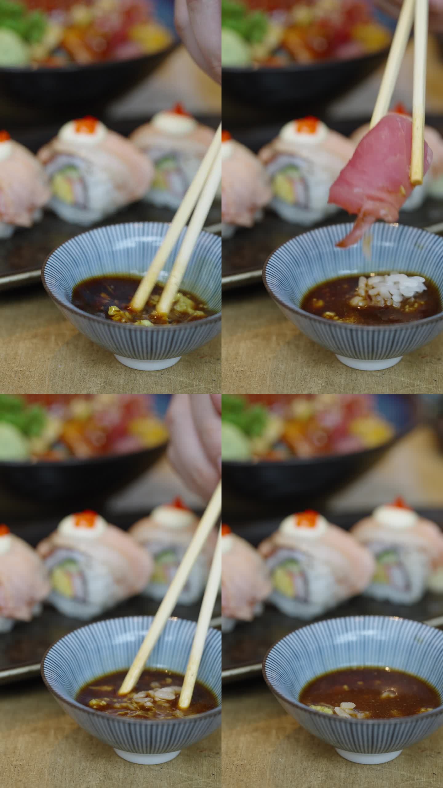 金枪鱼寿司蘸酱油海鲜美食