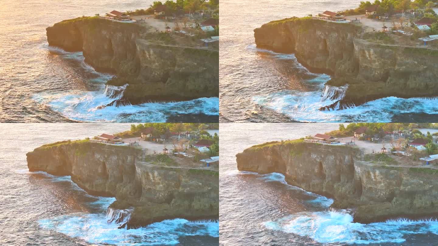 鸟瞰特写镜头，海浪冲击着印尼巴厘岛努沙佩尼达岛沿岸的岩石