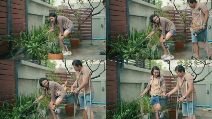 亚洲残疾夫妇打理花园。幸福的残疾夫妇在家里给小花园浇水。