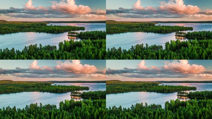 瑞典，斯堪的纳维亚半岛，日落时森林环绕的湖泊景观