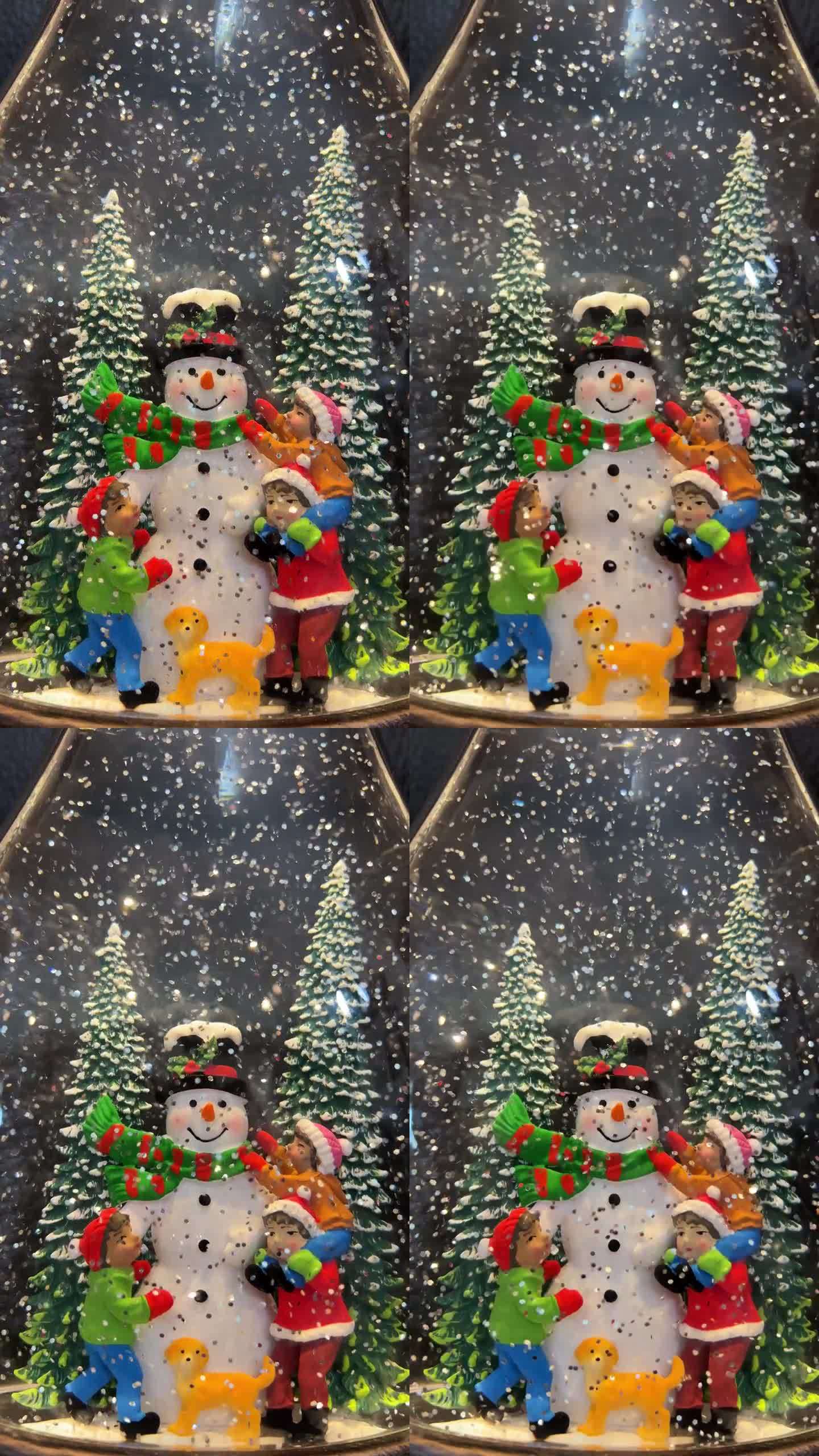 一个雪人站在上面微笑的雪花玻璃球，一条红条纹的绿围巾，一顶黑帽子，孩子们在他旁边和他一起玩，灿烂的雪
