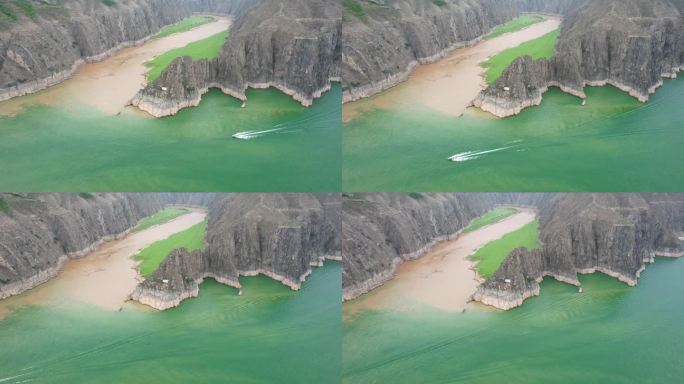 黄河河由绿变黄的航拍跟踪镜头