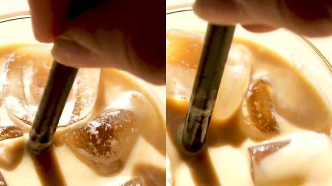 达尔戈纳咖啡，加冰和松软的奶油速溶咖啡，放在木托盘上。流行的韩国人在大理石棕色的桌子上喝拿铁
