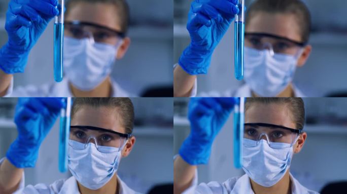 科学，玻璃烧杯和在制药实验室从事医学研究的女科学家。创新，专业和女性化学家研究人员与生物化学液体在实
