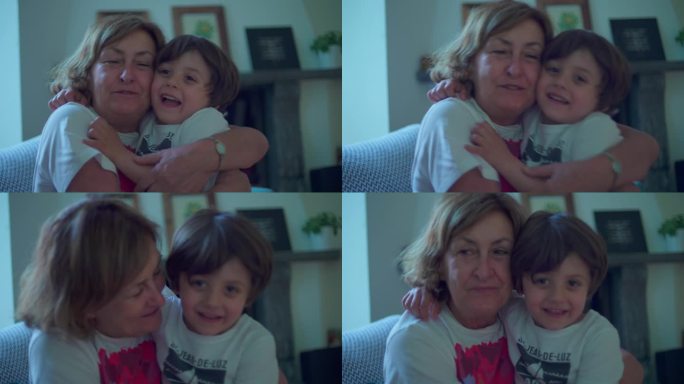 孩子用吻向年迈的祖母表达爱意，小男孩向长辈深情一吻