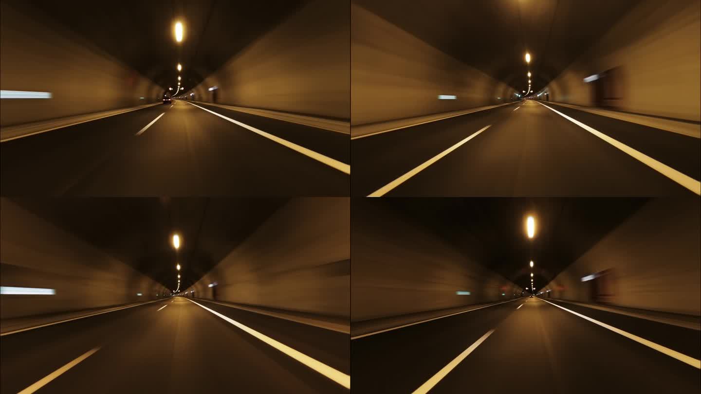 夏季，一家人在山间旅行时，在过渡公路的汽车隧道中，前方有明亮的橙色灯光。隧道过渡到白色结束