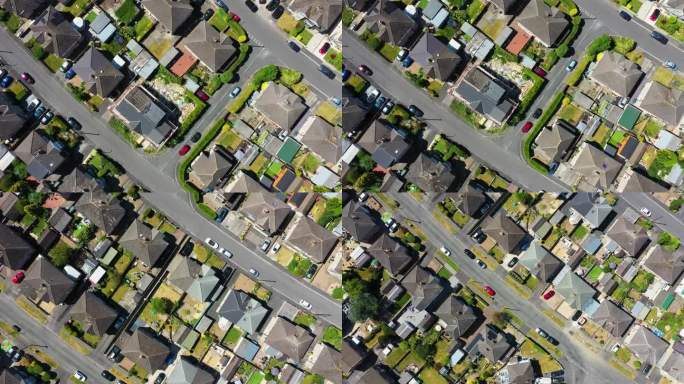 这是英国西约克郡布拉德福德市区的彬格莱镇的航拍照片，显示了英国夏季的住宅区和成排的房屋