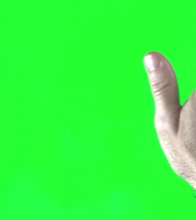 绿色背景chromakey男性多毛的手翻看不见的页面用食指从右到左从上到下和从下到上的技术文字广告空