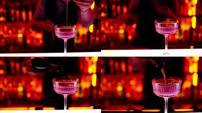 夜晚的酒吧里，酒保用白起泡酒调制鸡尾酒，红色的霓虹灯，慢动作