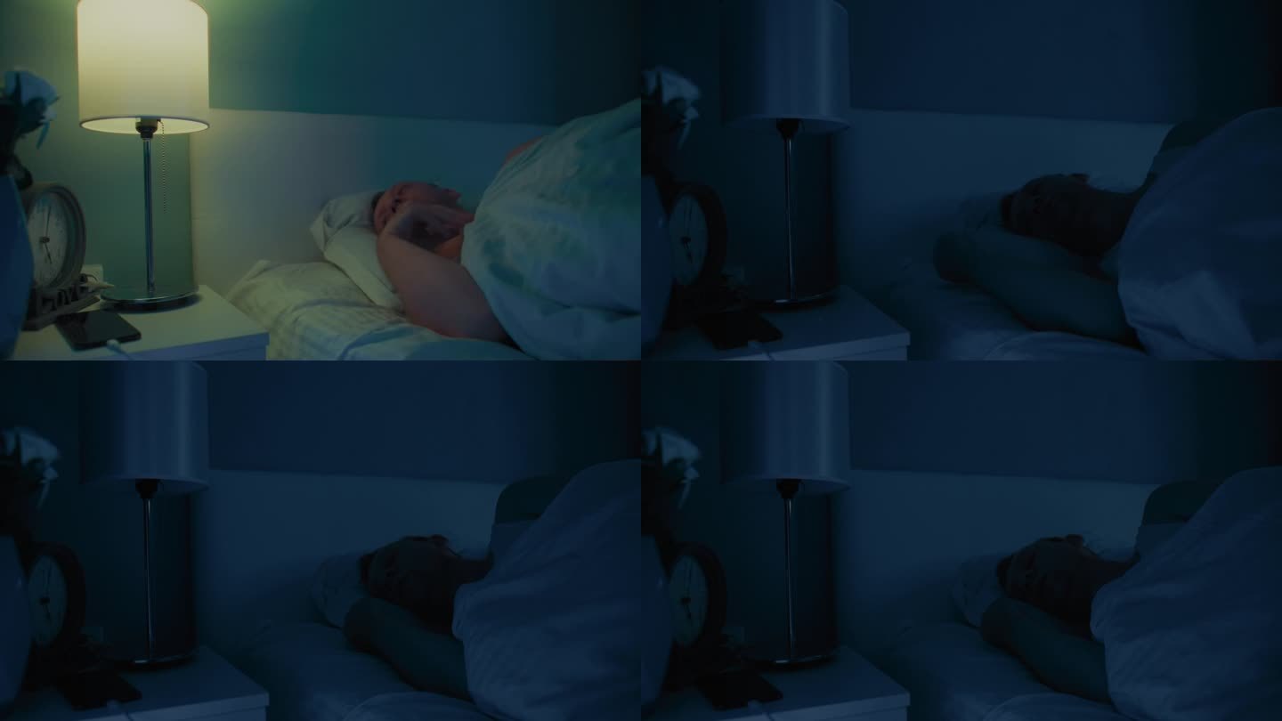 男人躺在舒适舒适的床上，关灯入睡