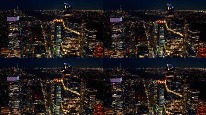 矗立在纽约壮丽的城市景观之上。无人机拍摄的城市夜景。