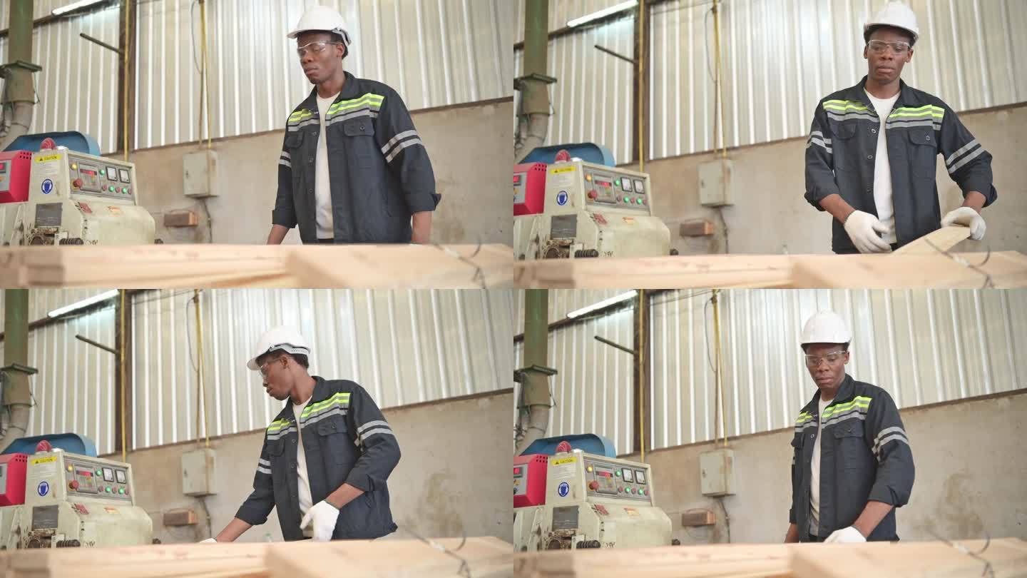 一名年轻的工人在一家木工工厂工作，使用木材锯床和切割机生产用于制作托盘的木片