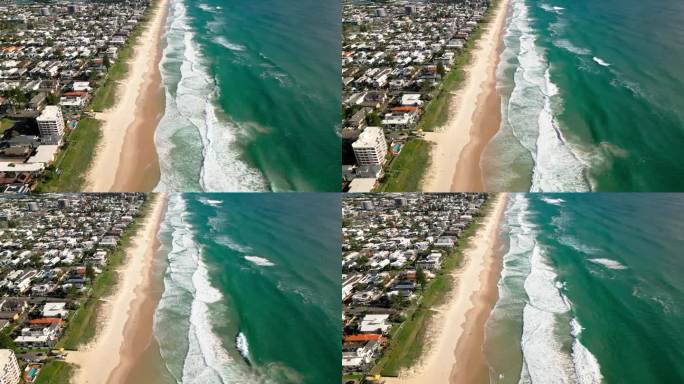 在黄金海岸的北伯利瞭望台拍摄的迈阿密海滩上的游客和冲浪的4K鸟瞰图