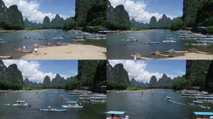漓江上载着游客的仿竹筏船航拍图