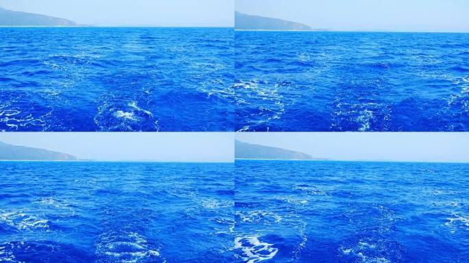 帆船背后的水面和蓝天。