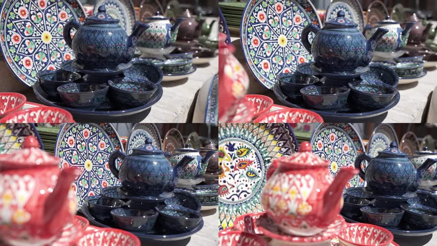 陶瓷民族乌兹别克菜、盘、壶、杯。花卉装饰画