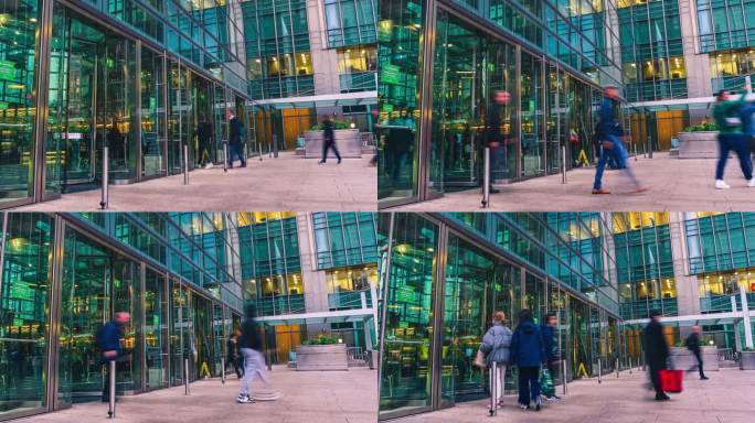 英国伦敦金丝雀码头大楼内拥挤的通勤商务人员通过自动旋转门进出办公大楼的延时镜头