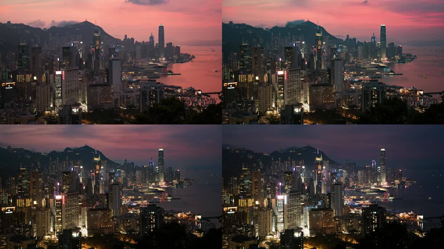 道路上的汽车交通运输，摩天大楼，维多利亚港，香港岛的灯光交响乐，城市景观。亚洲旅游地标概念