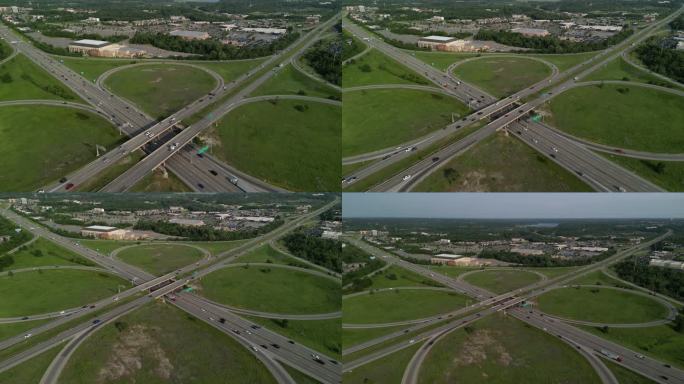 大都市多车道高速公路现代交通枢纽无人机俯视图。高速公路上交通拥挤。高架弯道，三叶草形状的桥，没有限速