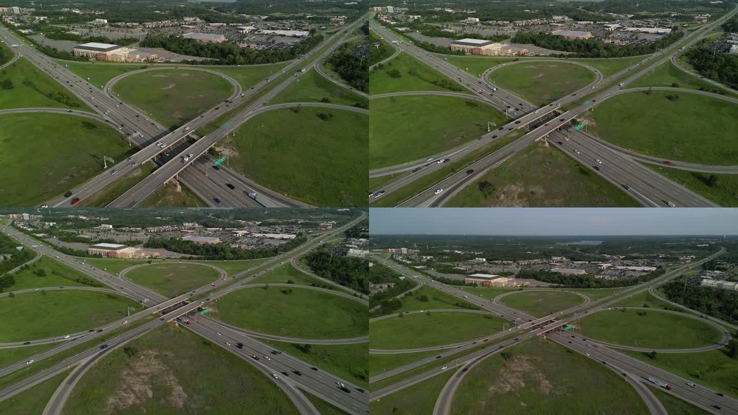 大都市多车道高速公路现代交通枢纽无人机俯视图。高速公路上交通拥挤。高架弯道，三叶草形状的桥，没有限速