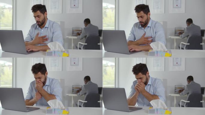 不健康的男性员工在办公室工作时咳嗽胸口痛