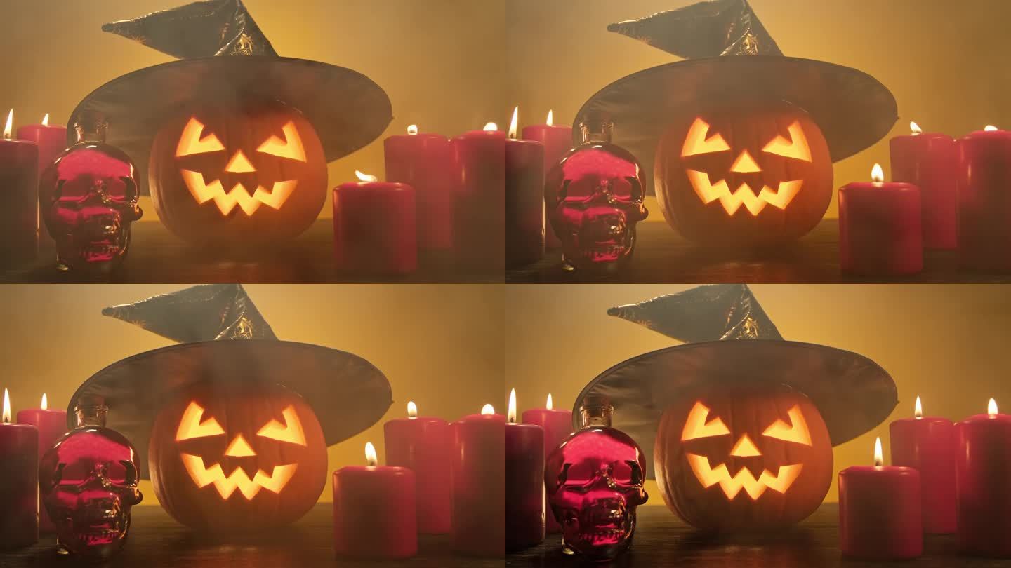 有蜡烛和骷髅头的南瓜。万圣节快乐。令人毛骨悚然的万圣节杰克灯笼