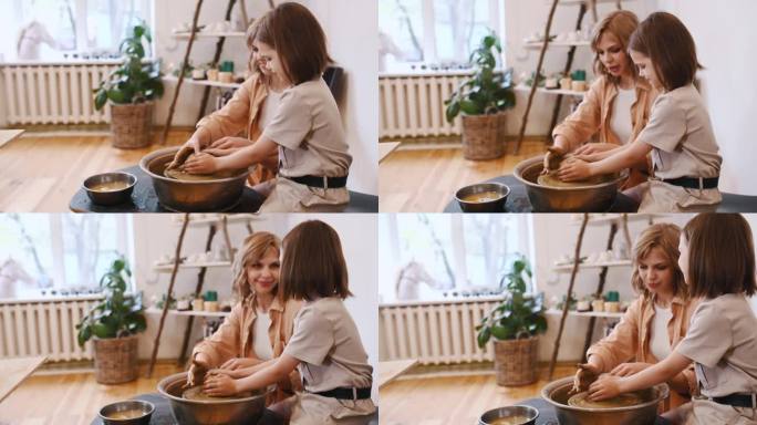 相视而笑，喜悦。妈妈带着小女孩练习陶艺。