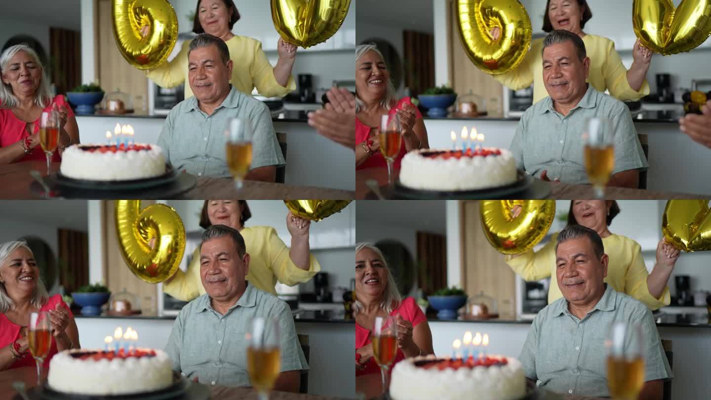 老人庆祝生日的照片，朋友们在家里拿着蛋糕唱生日快乐歌