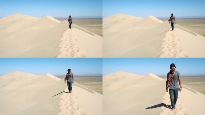 旅行者在蒙古戈壁沙漠中探索着名的洪高林埃尔斯沙丘