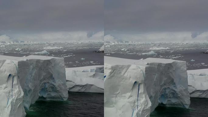 垂直视频冰山谷在南极的南极海洋。