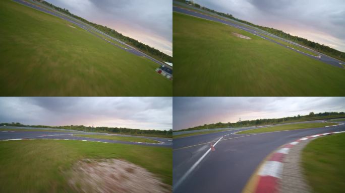 POV无人机高空鸟瞰赛车赛道。高速跟踪一辆汽车