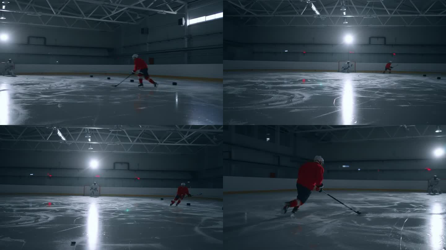 一名身穿红色运动衫的曲棍球专家在黑暗的冰场上训练，熟练地躲避障碍物，并向守门员进球