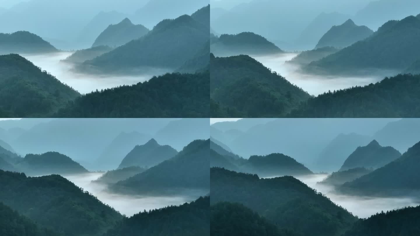 早晨日出前的山脉自然风光云雾缭绕的山顶日