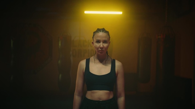 cinematic portrait of sportswoman in fight club, l
