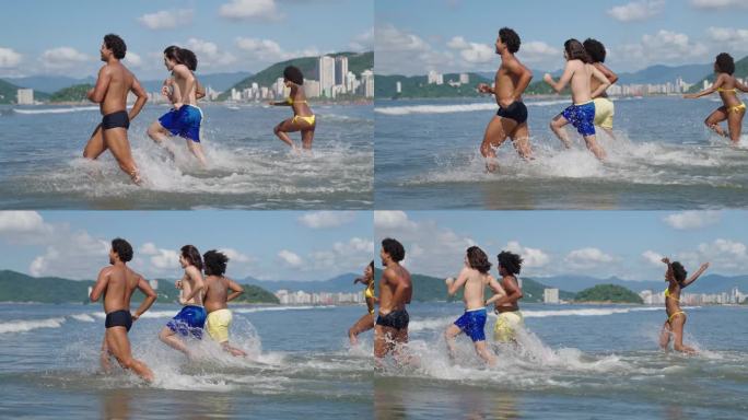 一群朋友在沙滩上以慢动作跑进大海，玩得很开心