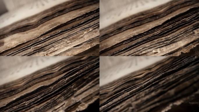 滑块宏观视图古代莎草纸，档案手稿。中世纪图书馆大部头