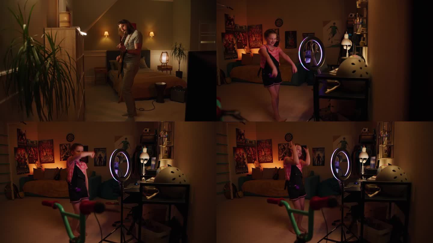男子在卧室里弹电吉他。镜头转向拍摄舞蹈视频的年轻女孩。