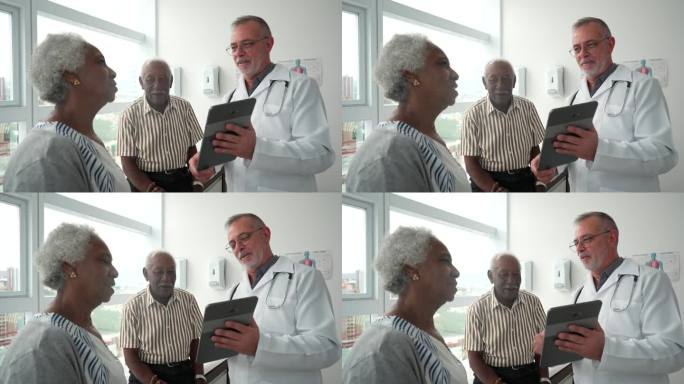 病人在医疗咨询，医生使用数字平板电脑