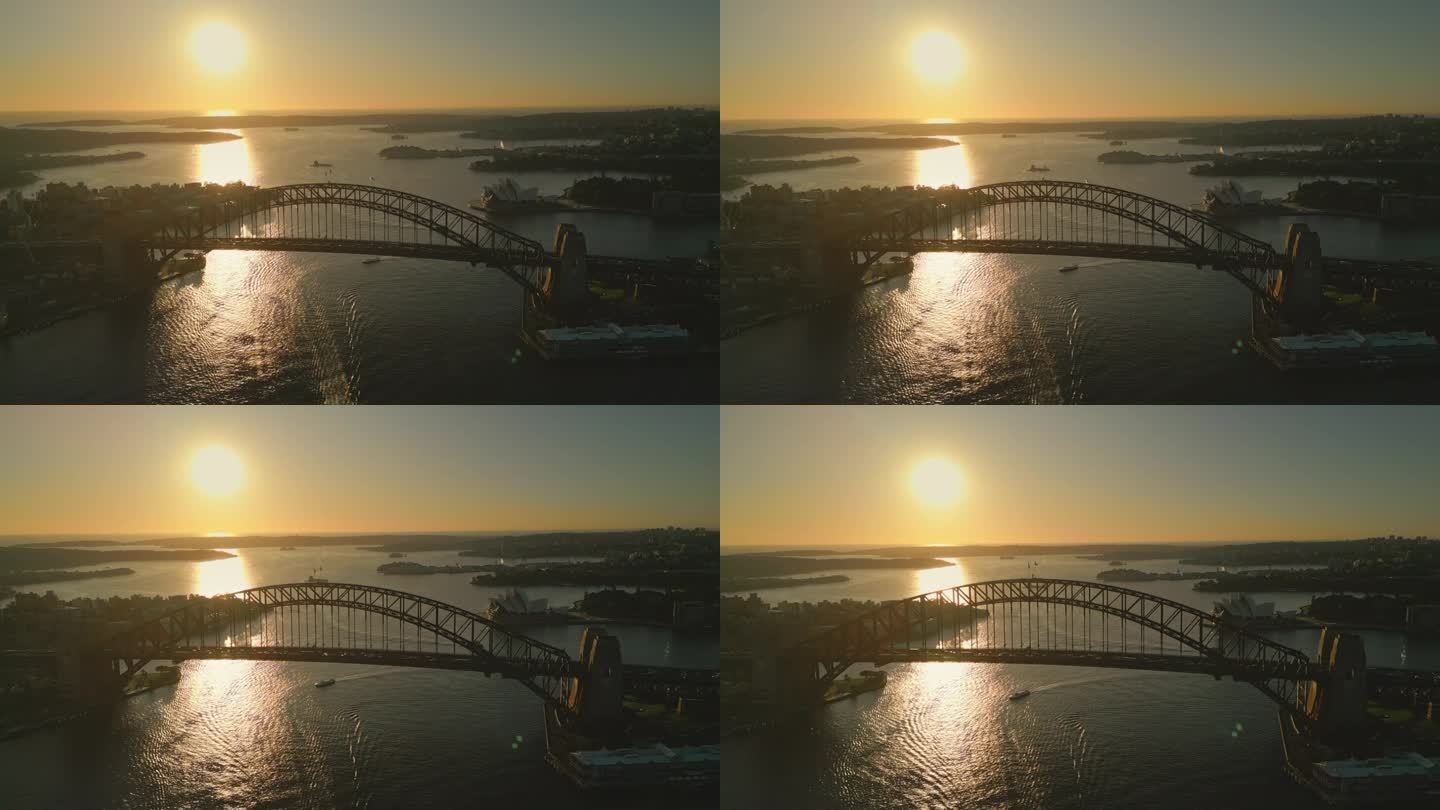 日出时悉尼海港大桥和歌剧院上空的4K鸟瞰图
