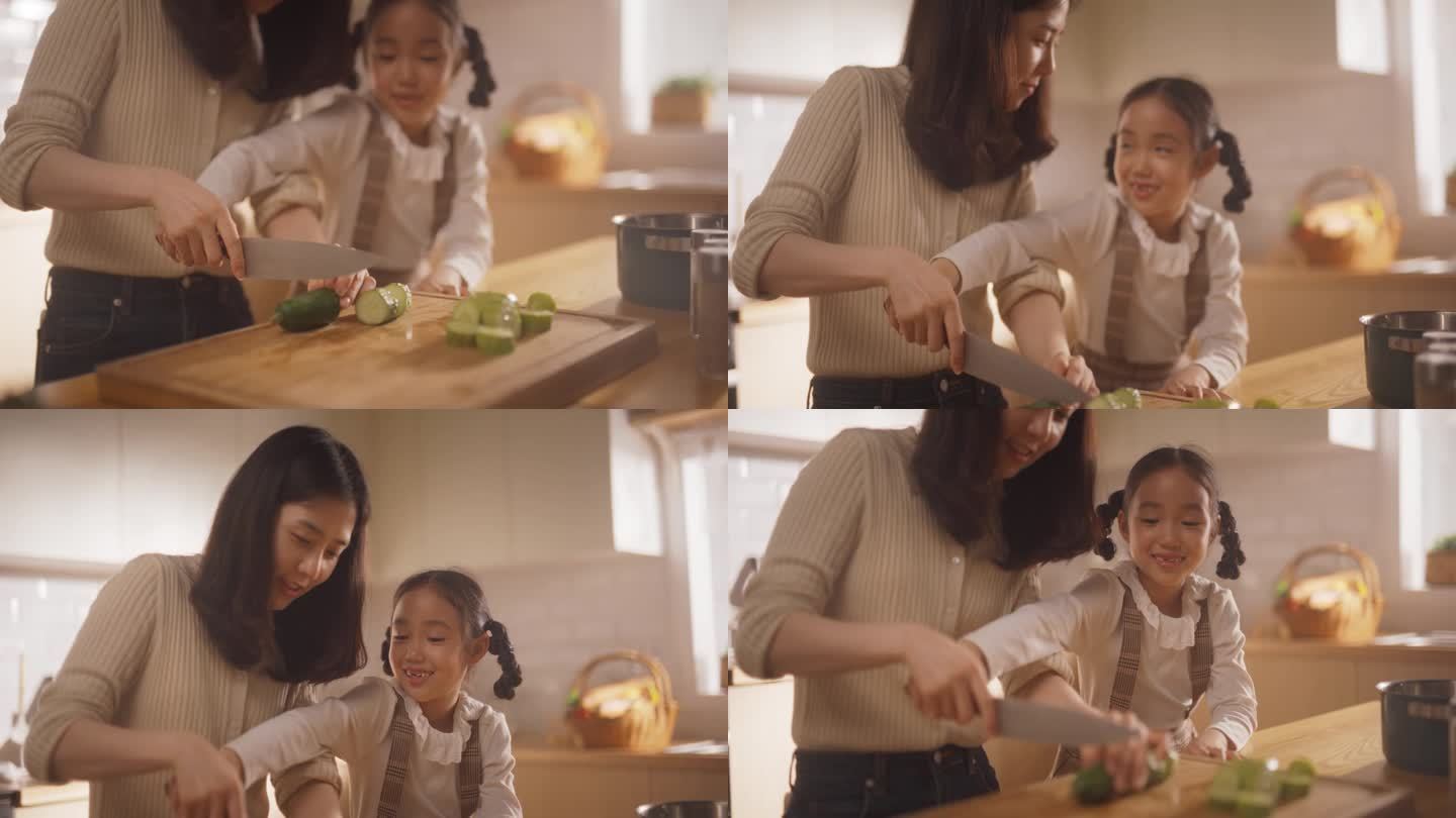 韩国妇女和女儿在厨房一起做饭的肖像。妈妈教她的小女孩如何切蔬菜。小女孩帮妈妈准备午餐。慢动作