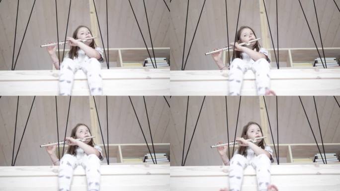 小女孩在演奏横笛
