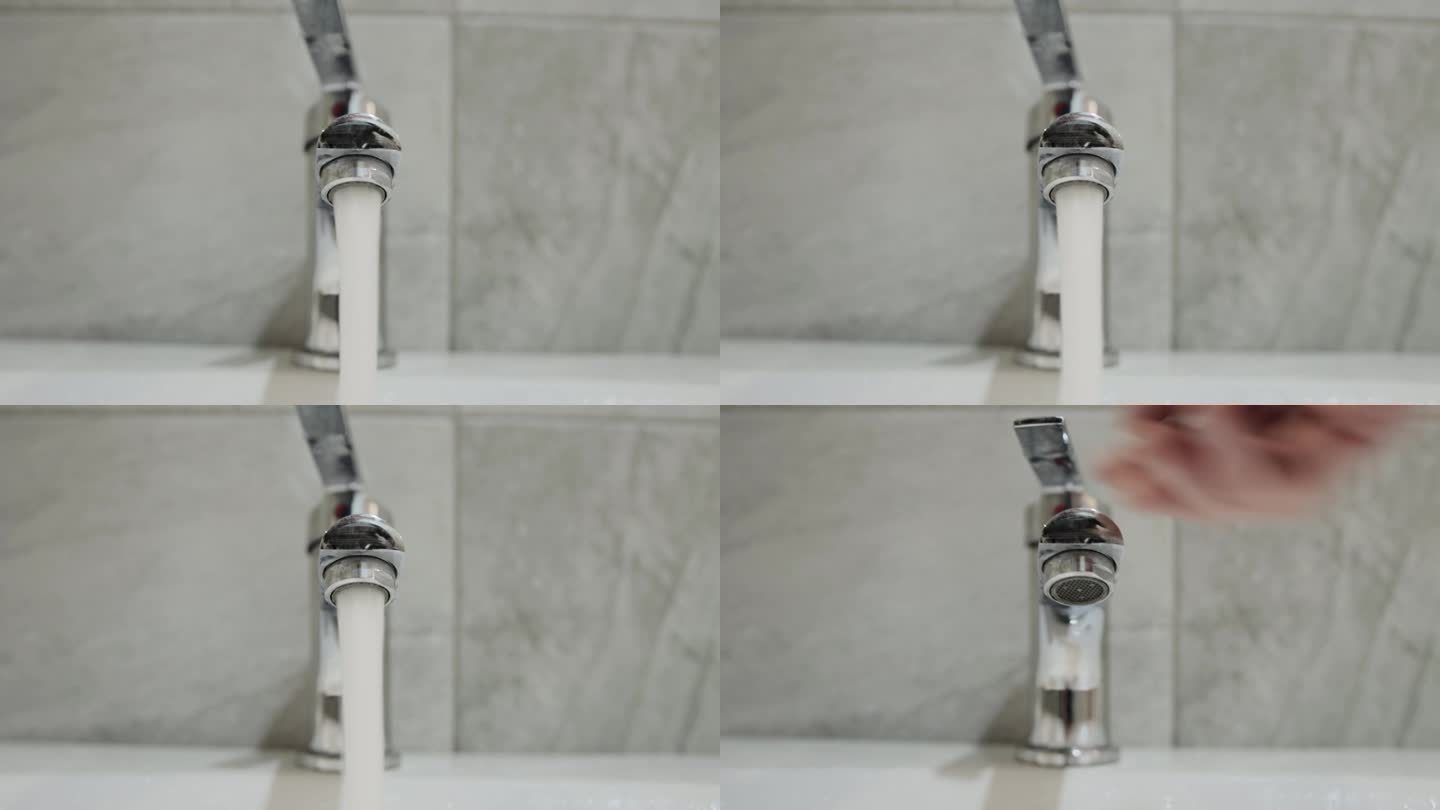 在浴室里用水龙头打开水，特写。水龙头的水压。水净化。文本复制空间