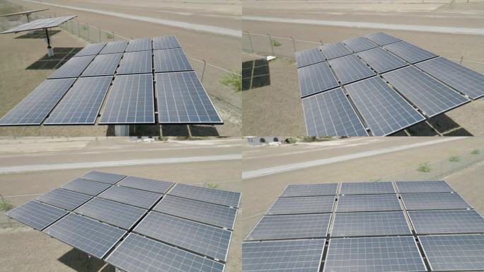 沙漠中太阳能电池板的空中无人机视图