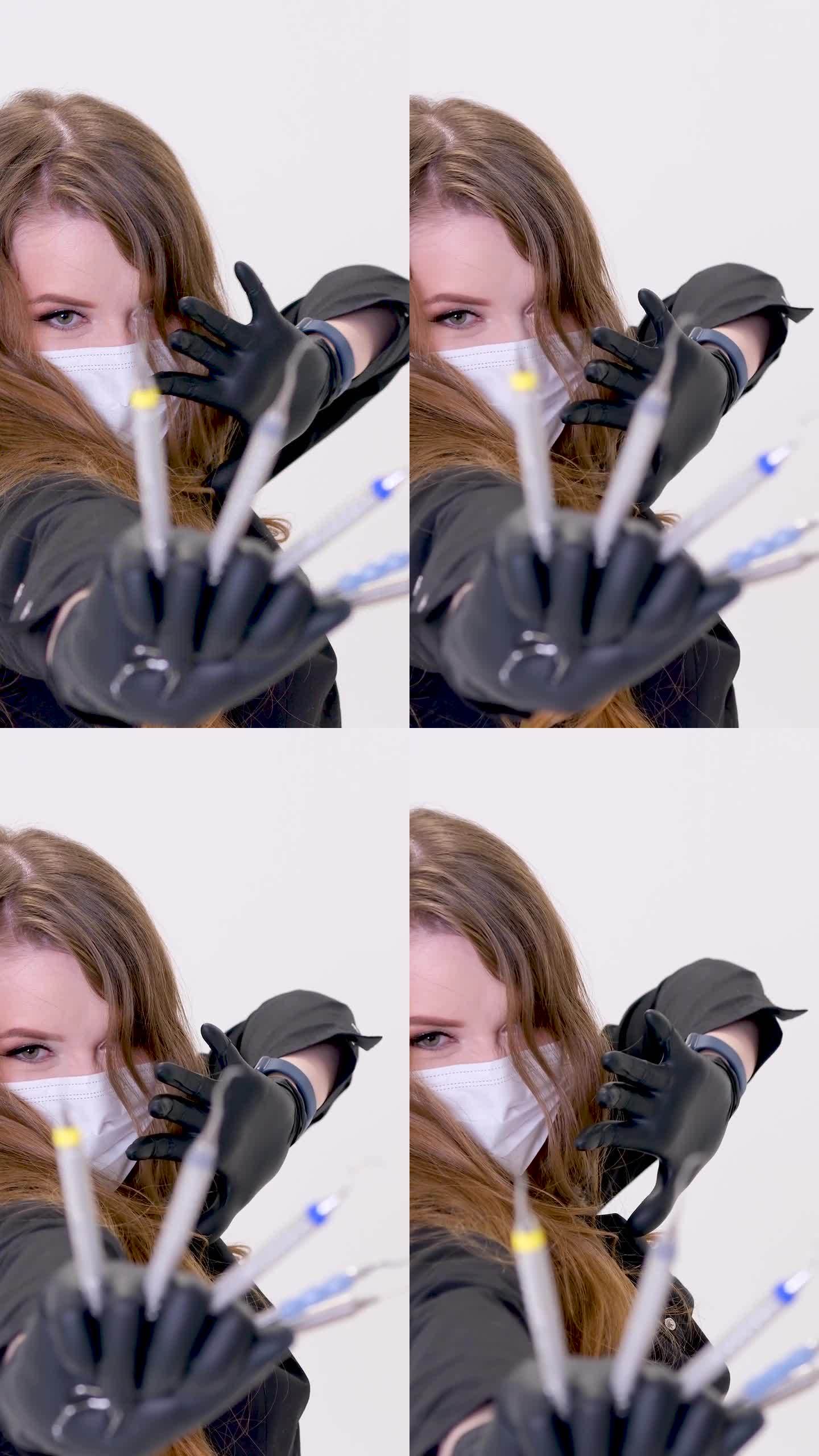 一个女牙医像忍者一样跳舞在她的手中，她有一个缩放器和一个刮胡刀她戴着一个面具，戴着黑色的手套，深色的