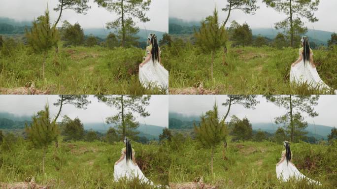 一位公主穿着白色的裙子走在长满绿草的森林里