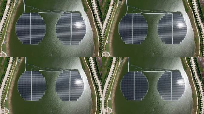 从空中俯瞰的太阳能电池板，一排排的多晶硅太阳能电池或漂浮在水面上的太阳能发电厂的光伏电池