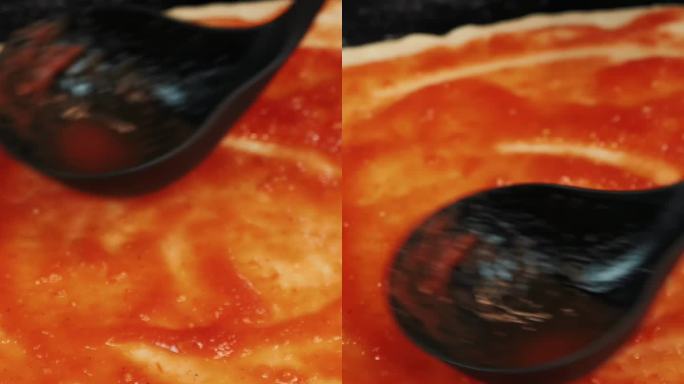 把番茄酱倒在披萨面团上，近距离。垂直视频。做匹萨