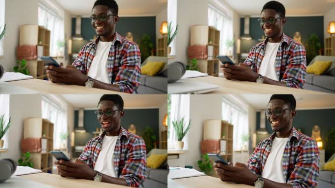一名非洲裔美国男子在学习之余使用手机